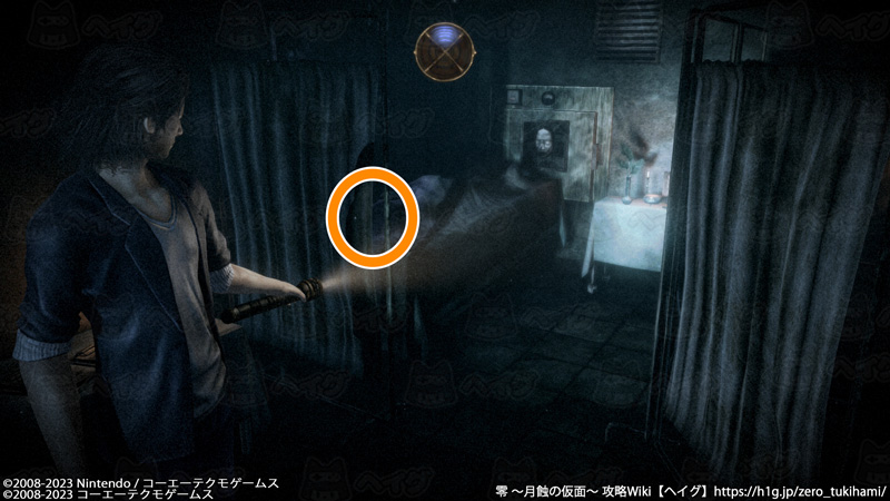 地縛霊「顔を削がれた死体」